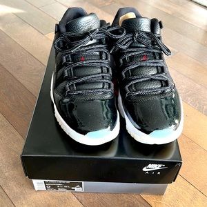 Air Jordan 11 Retro Low black with white rubber bottom